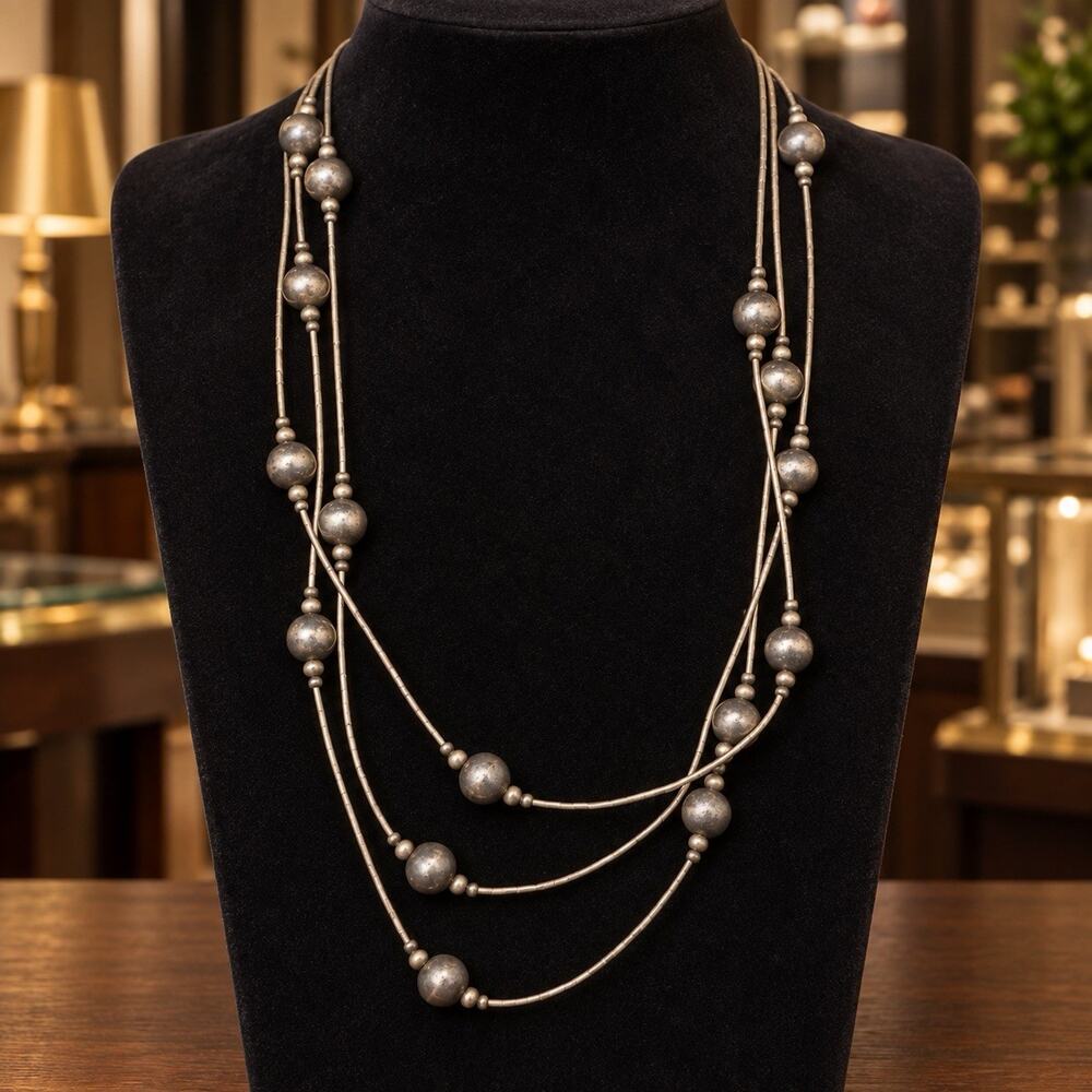 VTG NATIVE AMERICAN LIQUID SILVER AND SILVER BEAD TRIPLE STRAND NECKLACE--